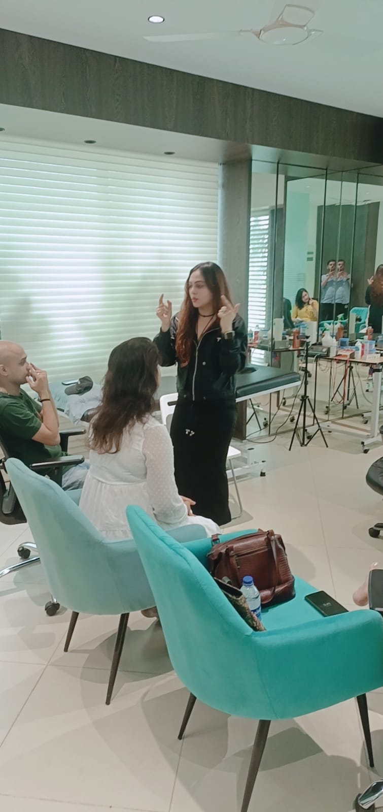 Vibha Jain conducting a clinical session